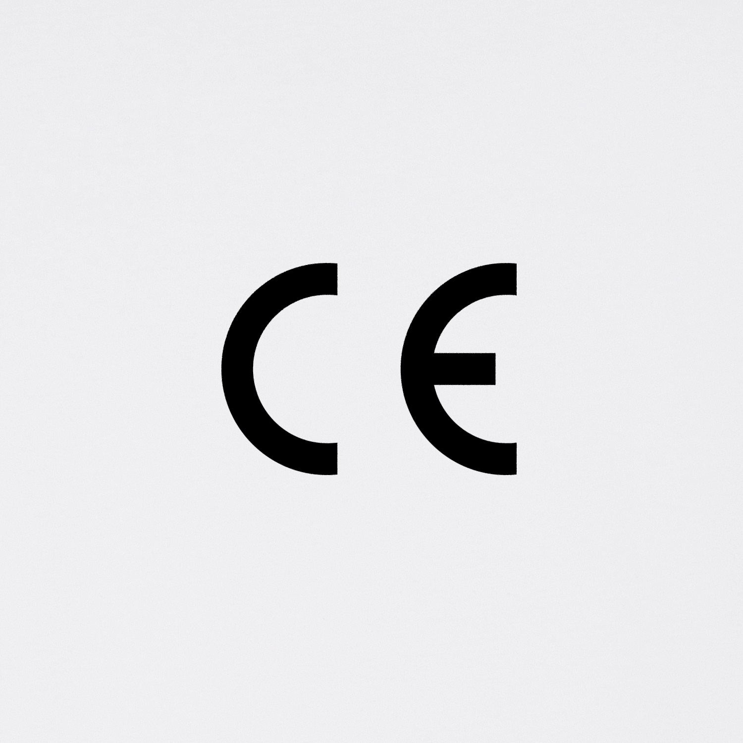 Detail of a white shirt with black print on front showing the official CE mark for consumer products